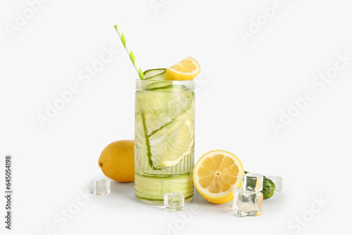 Glass of lemonade with cucumber on white background