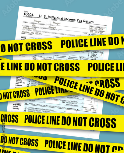 A USA federal income tax form 1040 is seen behind police crime scene tape in a 3-d illustration about evading taxes or not  paying tax to the IRS © Rob Goebel
