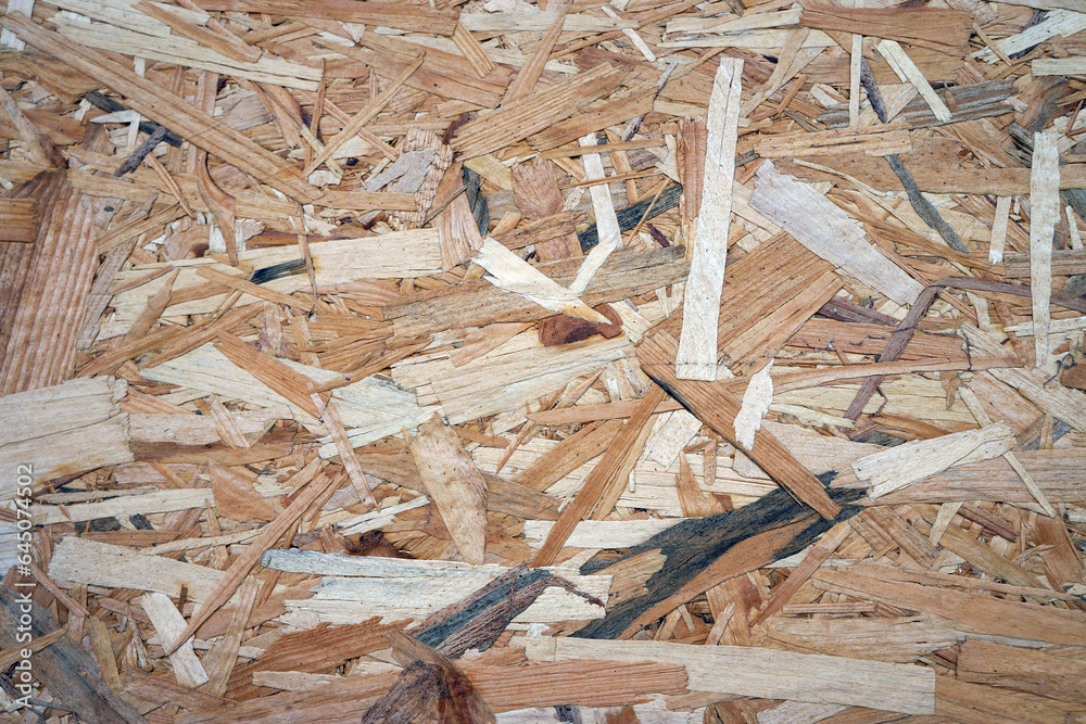 Sheet of plywood, recycled wooden board. Pressed wooden panel background, osb texture Sheet of plywood, recycled wooden board. Pressed wooden panel background, osb texture