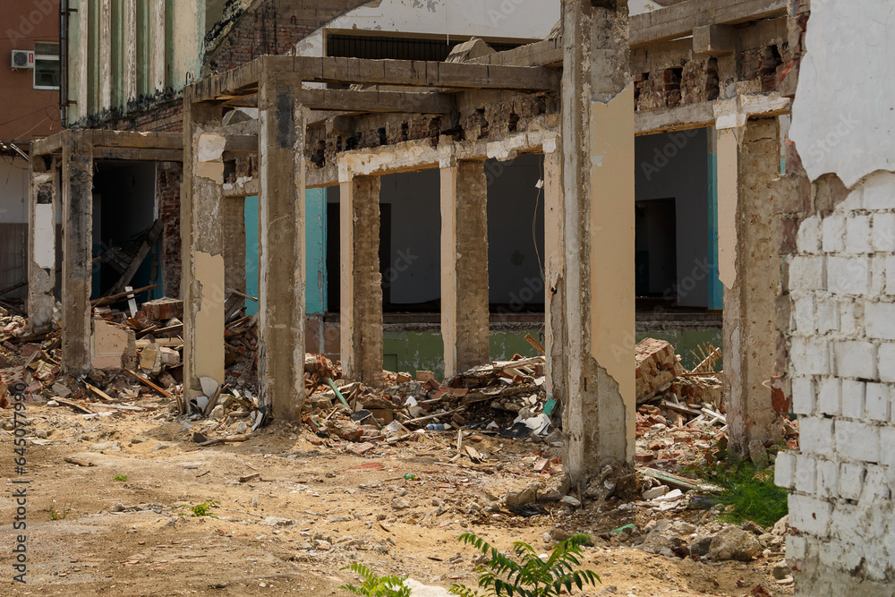 The destroyed building is the wreckage of the skeleton due to hostilities