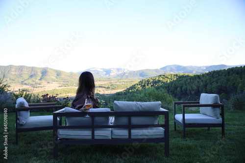 person sitting on a bench