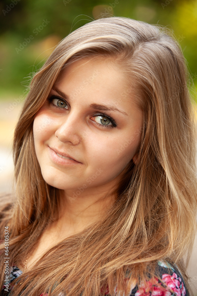 Portrait of a young beautiful girl in the park Portrait of a young beautiful girl in the park