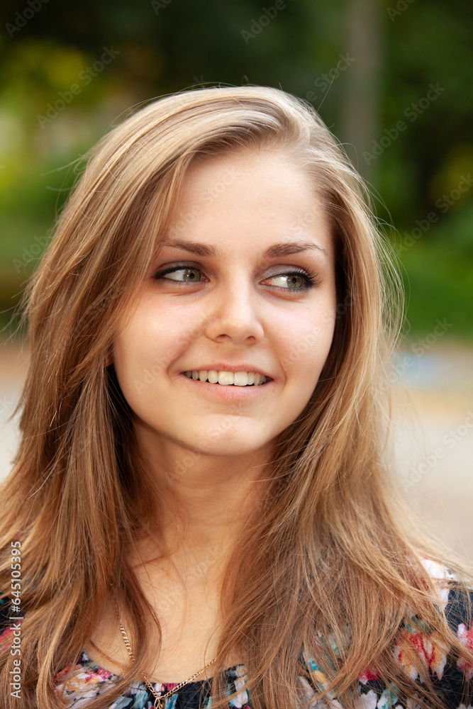 Portrait of a young beautiful girl in the park Portrait of a young beautiful girl in the park