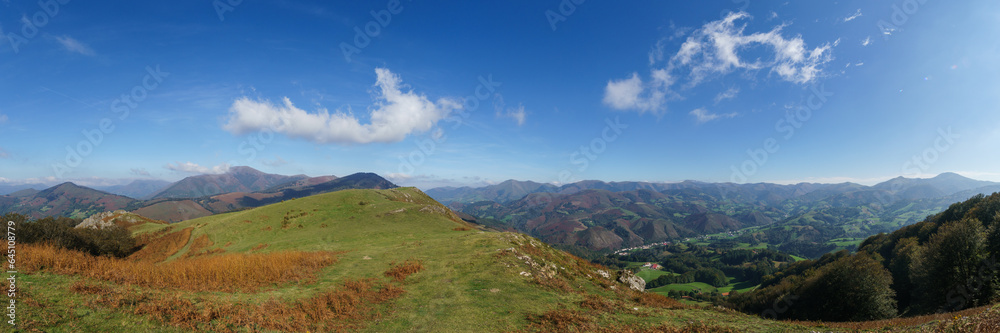 Panorama of beautiful basque countryside with meadow on the hill at the spanish french border near Beartzun, Navarre, Spain