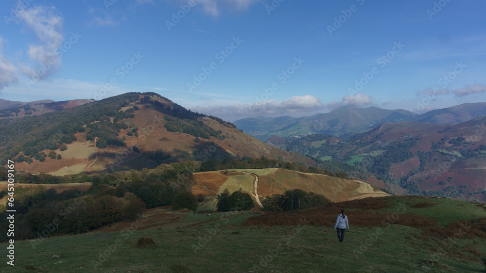 Hiking in beautiful basque countryside with meadow on the hill at the spanish french border near Beartzun, Navarre, Spain
