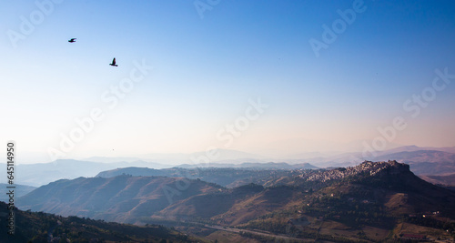 Scenic view from the hilltop town of Enna, overlooking the town of Calascibetta and the surrounding areas. 