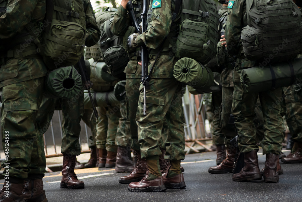 Army soldiers await the start of the Brazilian independence parade in the city of Salvador, Bahia.