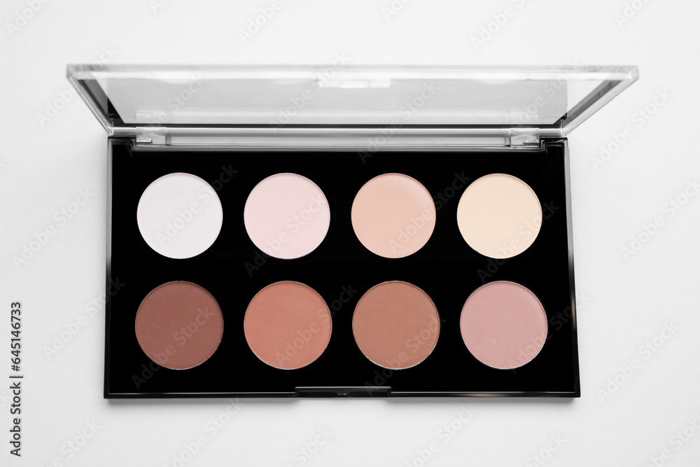 Colorful contouring palette on light grey background, top view. Professional cosmetic product Colorful contouring palette on light grey background, top view. Professional cosmetic product