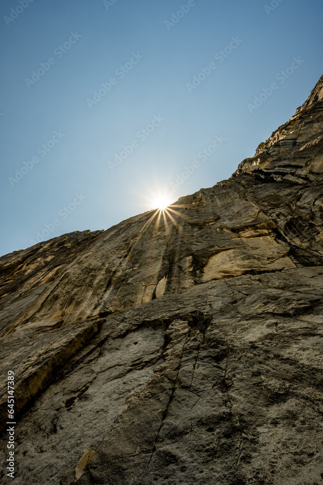 Fototapeta premium Sunburst Over The Wall Below Eagle Tower