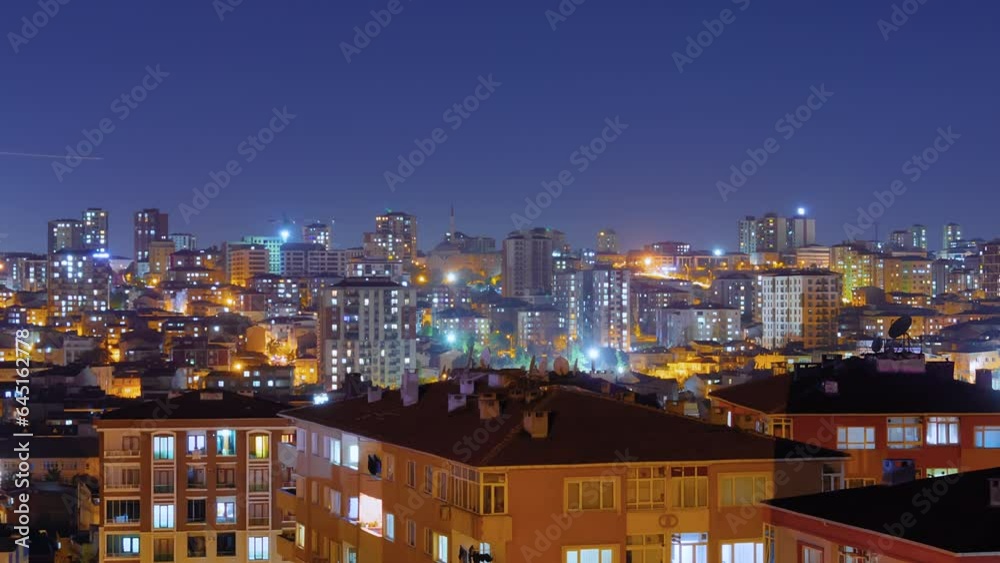 Timelapse: typical turkish multistory residential buildings with fast blinking illuminated windows and warm street lighting in Istanbul, Turkey at night. Architecture and time lapse concept