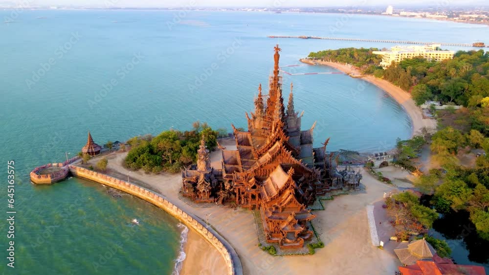 Wooden temple by the ocean Sanctuary of Truth, Pattaya, Thailand, Sanctuary of Truth pagoda during sunset, Buddhist temple by the ocean at sunset