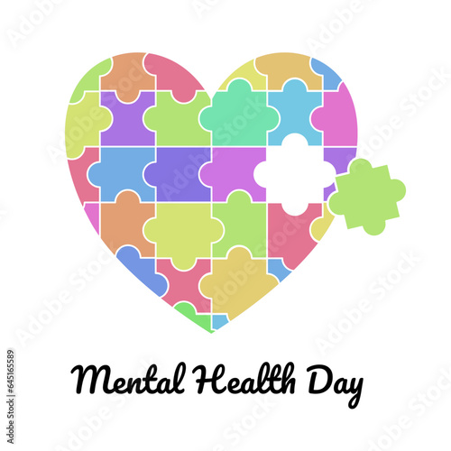 heart shape with puzzle pieces and mental heath day text