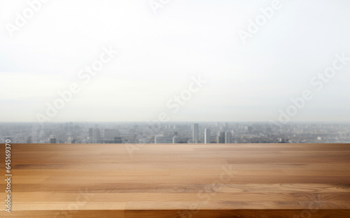 Empty wooden table over blurred cityscape background, product display montage. High quality photo