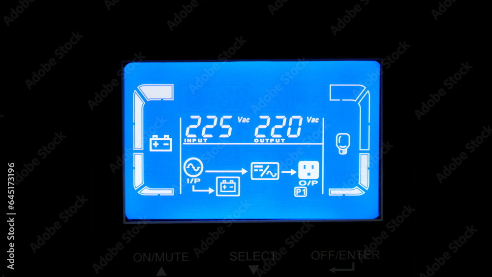 Close up of digital display on uninterruptible power supply with automatic voltage stabilizer. Close up of digital display on uninterruptible power supply with automatic voltage stabilizer.