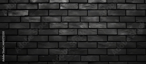 Black brick wall texture on white background, suitable for product display or montage.