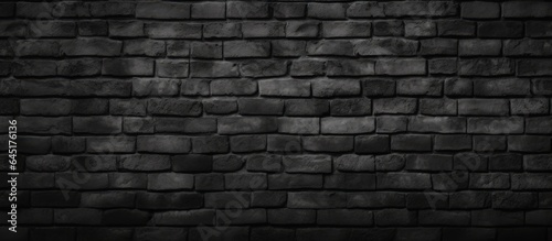 Black wall texture background for design and architecture, suitable for artwork, wallpaper, and construction projects.