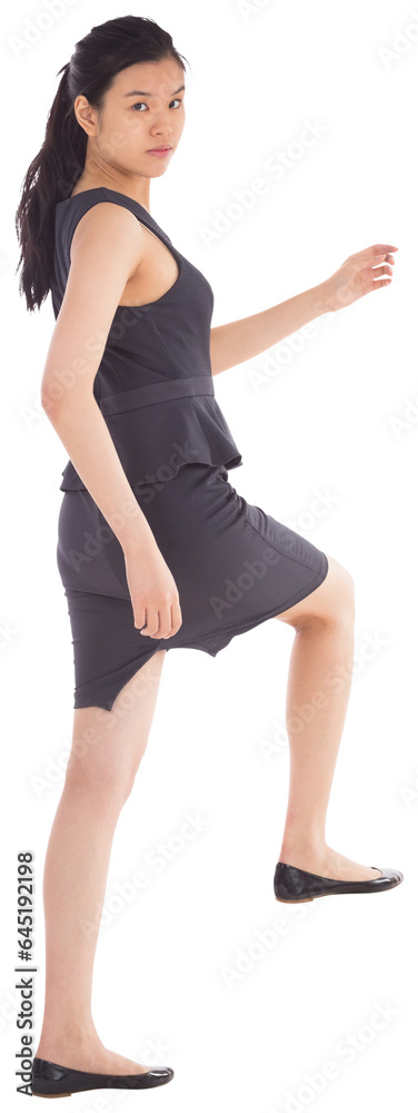 Digital png photo of asian businesswoman climbing stairs on transparent background Digital png photo of asian businesswoman climbing stairs on transparent background