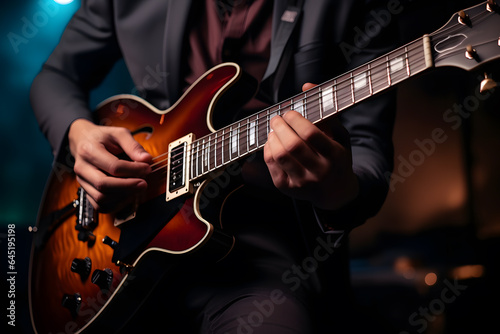 A student playing a electric guitar in a band
