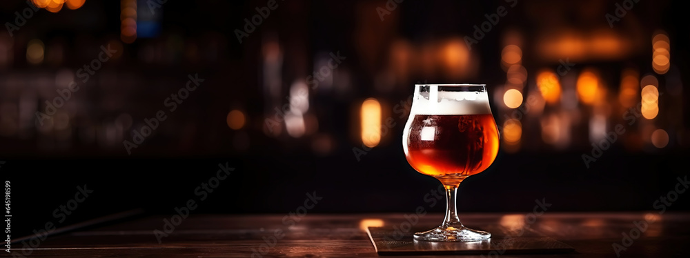 Snifter glass of light beer on bar table in a dark pub with copy space. Generative AI