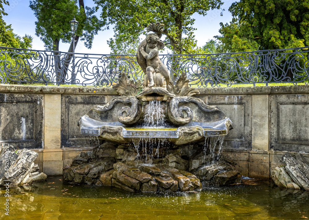 The dolphin fountain on the Bruehl terraces in Dresden, Saxony