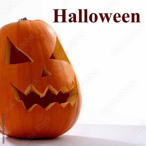 Composite of halloween text and carved halloween pumpkin on white background