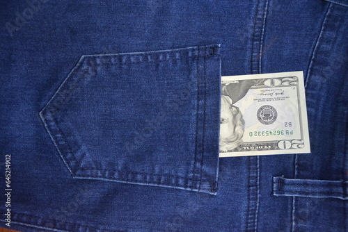 money (dollar) in jeans pocket