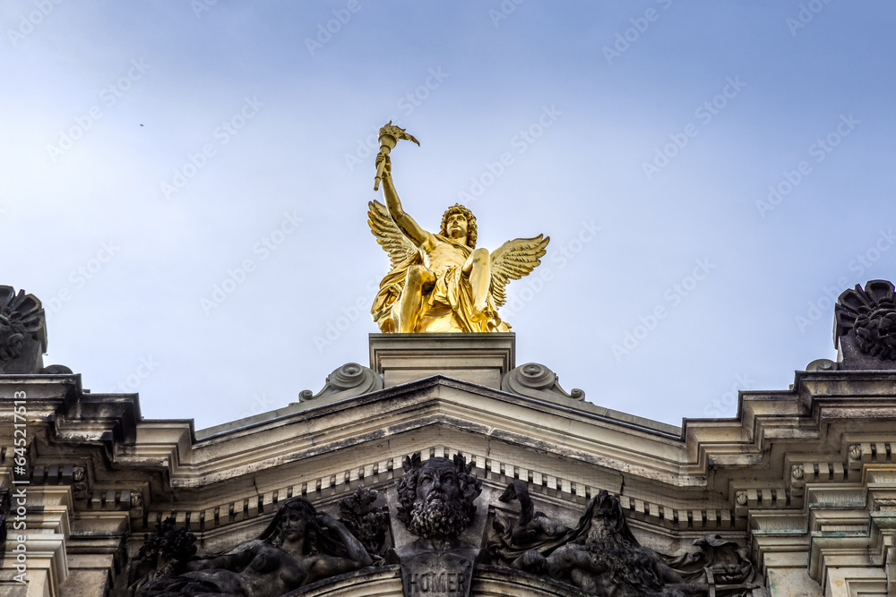 The golden sculpture of Cupido on the roof of the art academy in Dresden