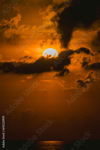 sunrise over the sea with clouds