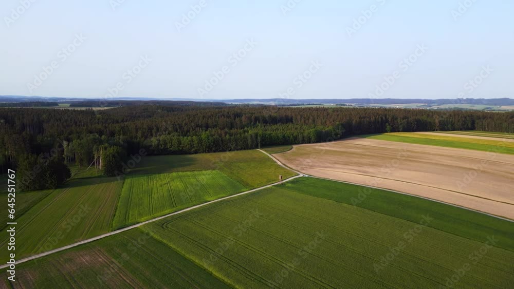 Fantastic aerial view flight drone austria hunting Box field road sunset Europe Fantastic aerial view flight drone austria hunting Box field road sunset Europe