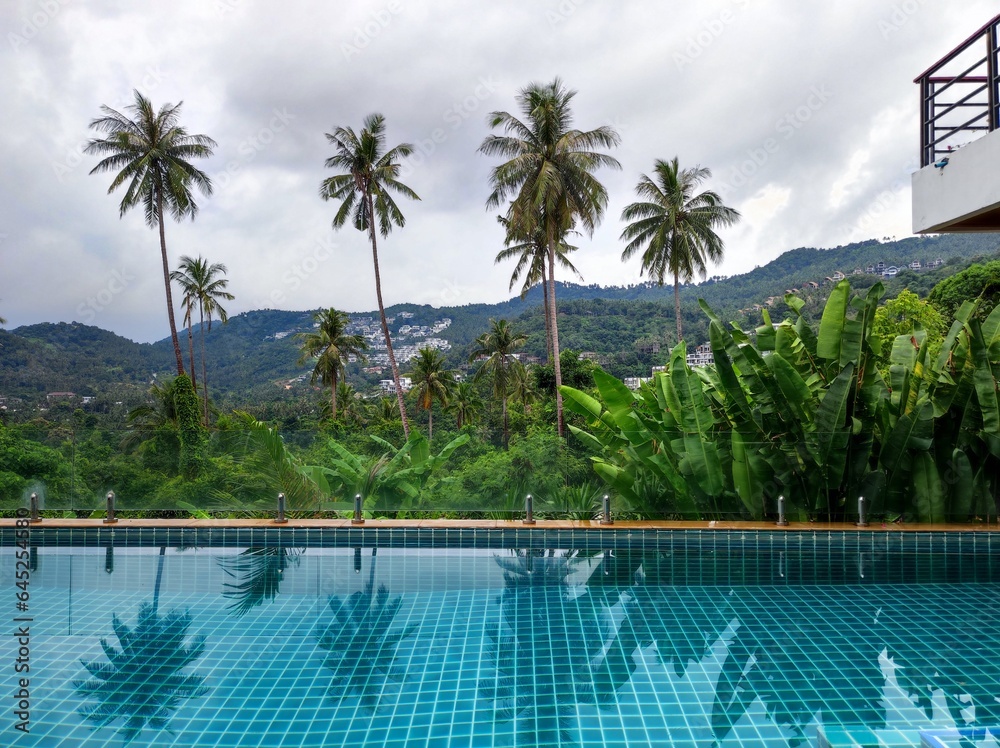 Picturesque pool in a cottage on a mountainside with a beautiful view of the mountainous tropical area