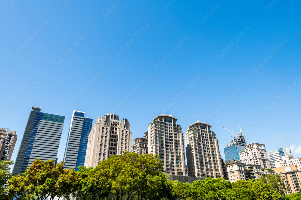 Low angle view of the modern architectural landscape in Taichung, Taiwan. It is near the National Taichung Theater. Low angle view of the modern architectural landscape in Taichung, Taiwan. It is near the National Taichung Theater.