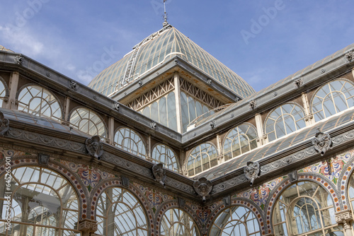 Crystal Palace (Palacio de cristal) in Retiro Park,Madrid, Spain. Is the main attraction of the park (built in 1887 by the architect Velazquez Bosco). Detail of the crystal palace. photo