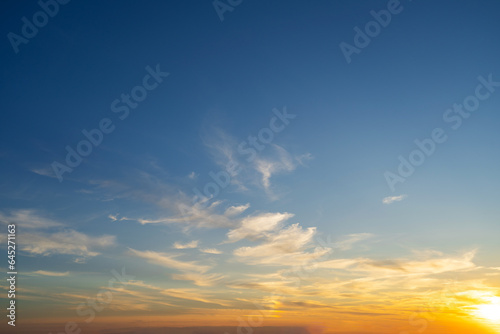summer evening  sunset in yellow  orange and pink with clouds  background