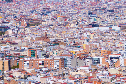 Barcelona city, Spain looked from an airplane view from the sky. Beautiful sunny clear blue sky day. Travel fly concept. High quality photo