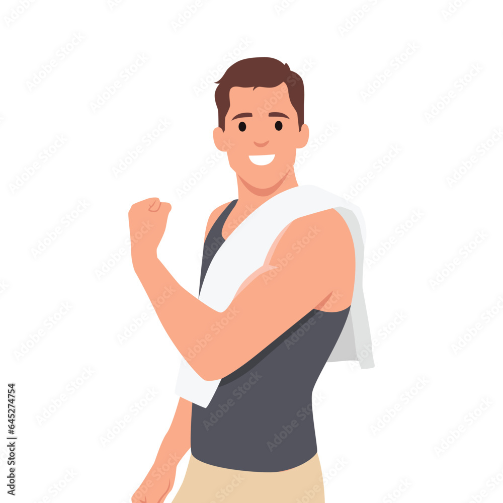 Young man shows developed muscles of the torso and shoulder girdle. Flexing his muscle with towel on his shoulder.