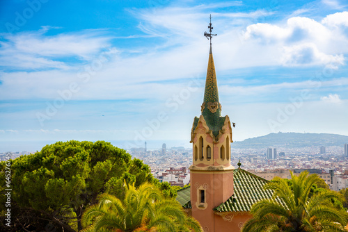 Park Guell in Barcelona and the city of Barcelona in the background. Beautiful postcard concept. High quality photo
