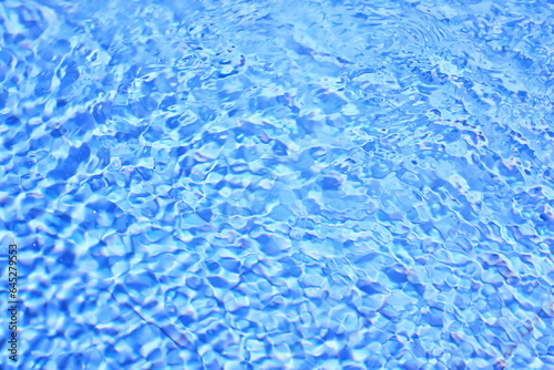 texture of transparent clear water in the pool blue abstract background