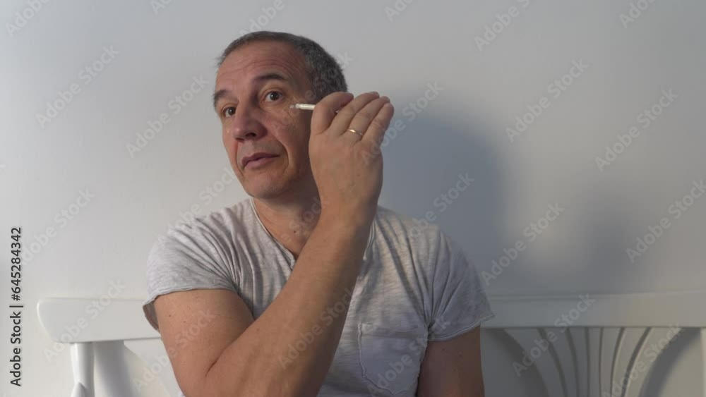 Middle-aged man taking care face Middle-aged man taking care face