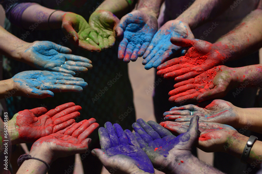 Color powder on hands during holi festival near Pune Maharashtra India