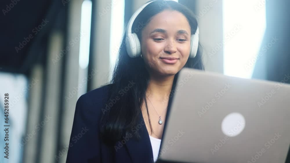 Portrait of beautiful businesswoman having video call conference meeting by laptop computer at modern office centre Smiling confident female talking on working or personal conversation outdoors Portrait of beautiful businesswoman having video call conference meeting by laptop computer at modern office centre Smiling confident female talking on working or personal conversation outdoors