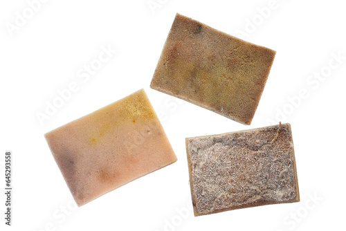 Foto Old dirty dish washing sponge with worn out surface used to clean in kitchen, to