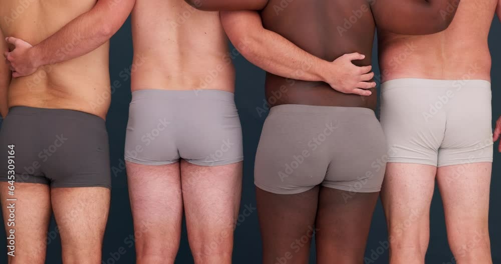 Body positivity, diversity and men in underwear with community, confidence and back of plus size people in studio. Friends, group and male beauty on grey background with solidarity and pride together Body positivity, diversity and men in underwear with community, confidence and back of plus size people in studio. Friends, group and male beauty on grey background with solidarity and pride together