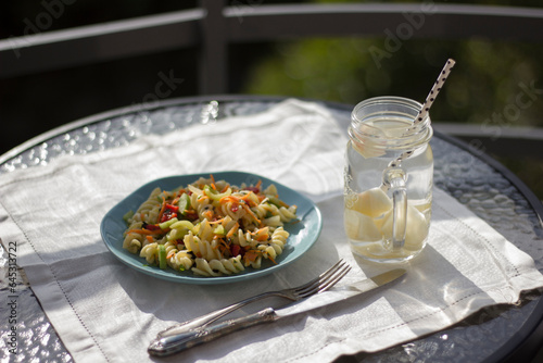 Pasta salad with fresh vegetables.