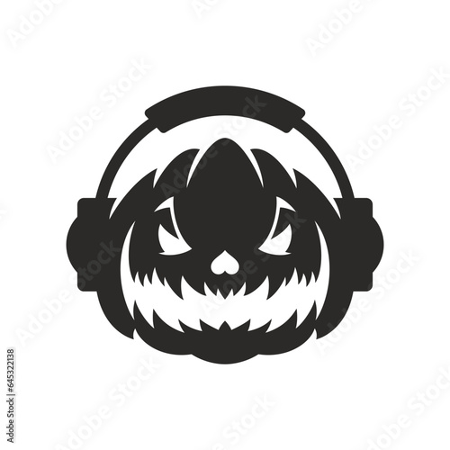 Halloween party pumpkin DJ in headphones black monochrome silhouette icon vector flat illustration