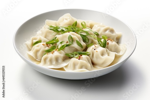 A white bowl filled with dumplings covered in sauce. Fictional image. Chinese wonton soup.