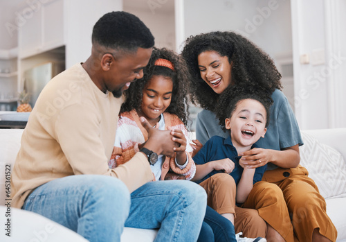 Thumb war, happy family and living room sofa with love, support and fun with parents and kids. Home, mother and father with children and funny joke on a lounge couch with black people and game