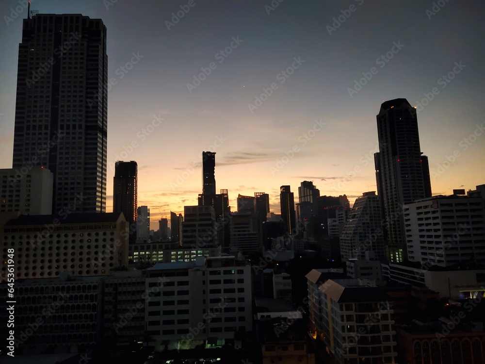 Silhouette of tall buildings in the city center.