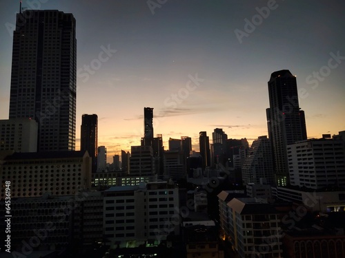 Silhouette of tall buildings in the city center. © Supanee