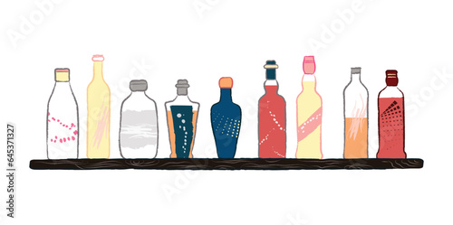 Different types of alcoholic drinks on a black wooden shelf