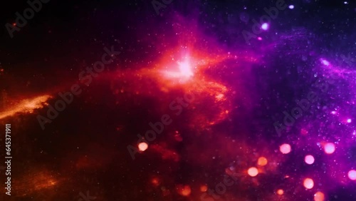 Orange and purple abstract nebula effect. Morphing particles and wispy smoke fills the screen.